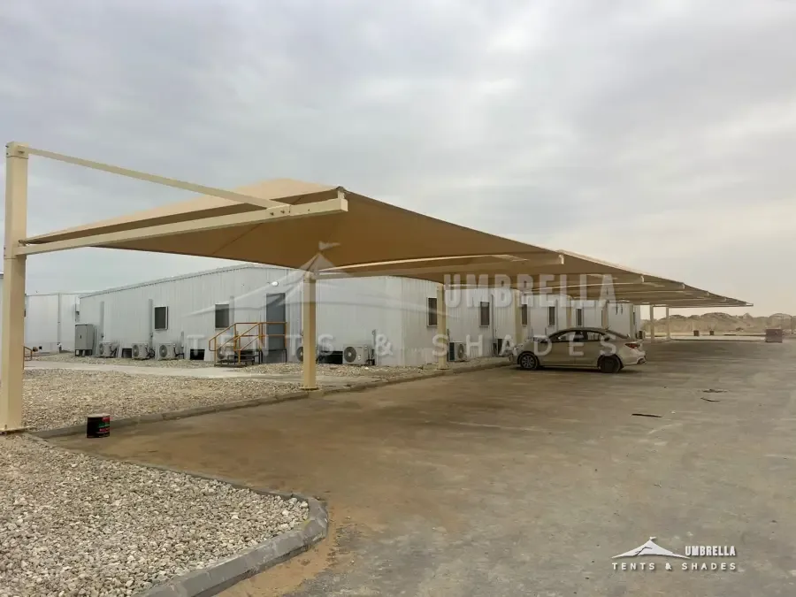 Row of pyramid car parking shades at an industrial site in Dammam